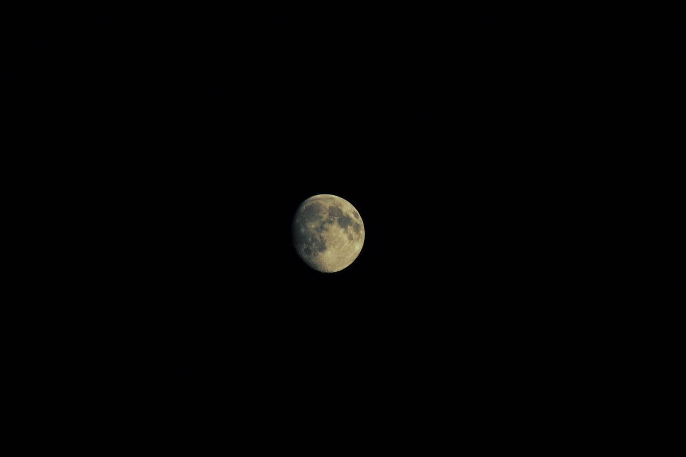 A detailed photograph of the full Moon against a black night sky