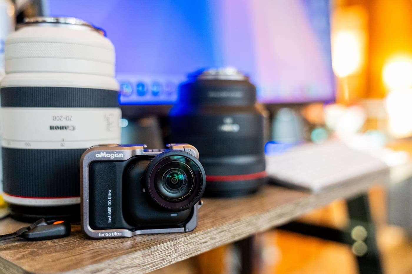 Optical equipment and lenses laid out on a desk