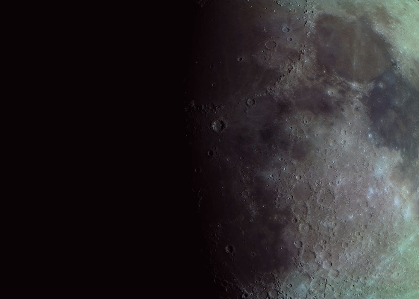 A high-resolution photograph of the Moon's craters and surface texture
