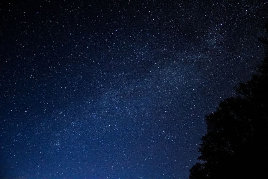 The Milky Way and dense star clusters in a dark night sky