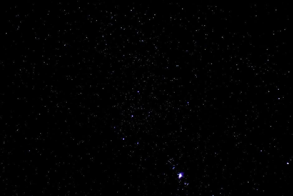 A starry night sky filled with constellations and celestial bodies