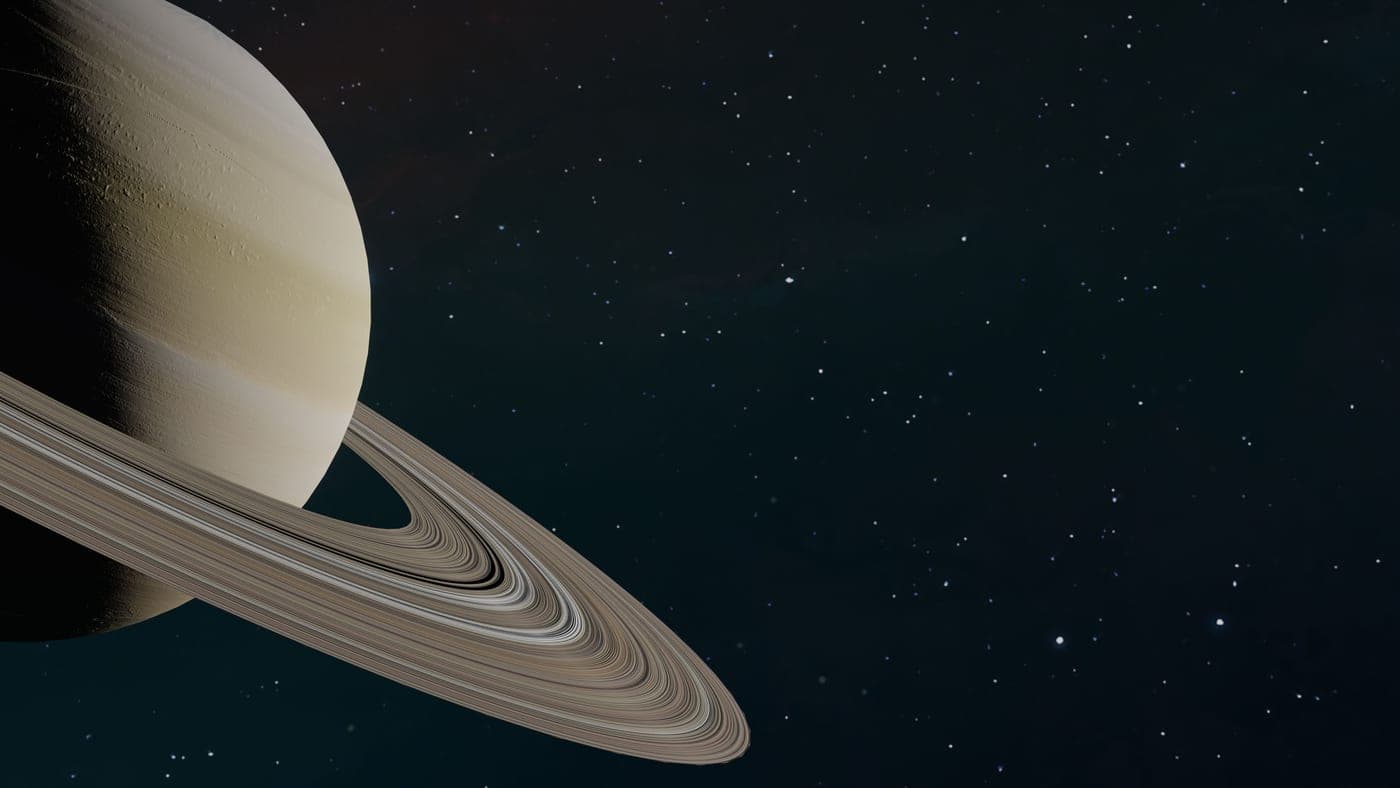 A space photograph of Saturn and its ring system, far beyond what a beginner telescope shows